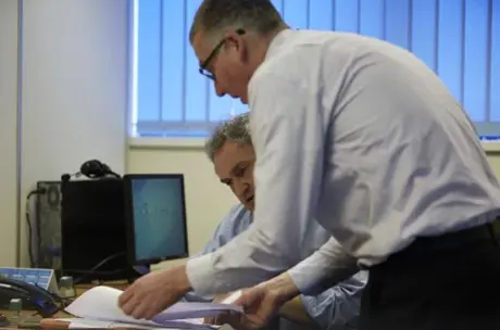 Two attorneys discussing a case