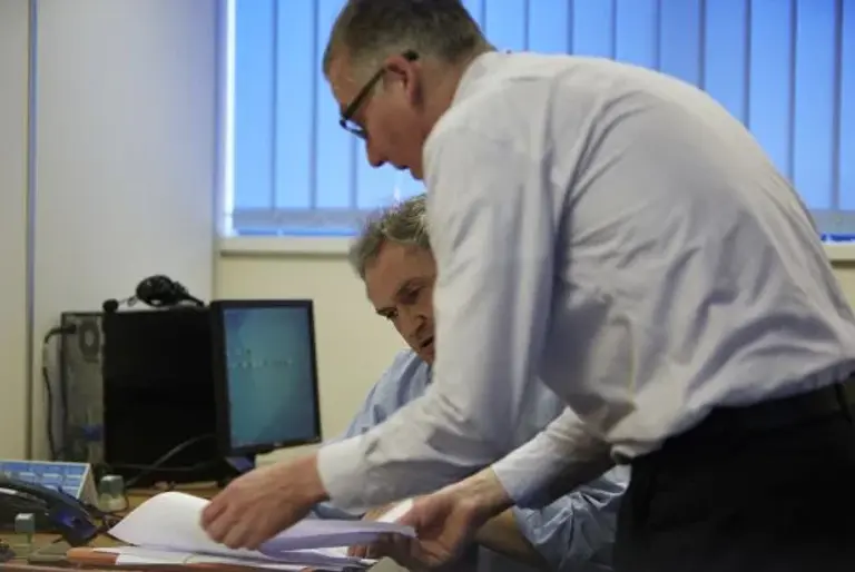 Two attorneys discussing a case Two attorneys discussing a case