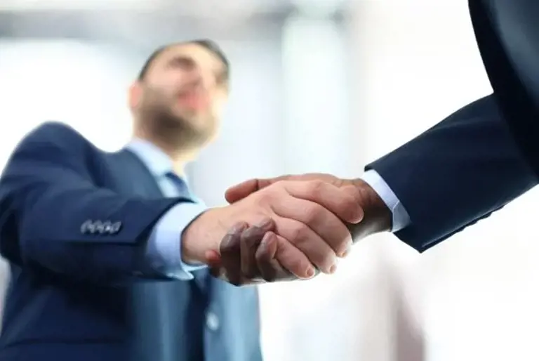 business people shaking hands