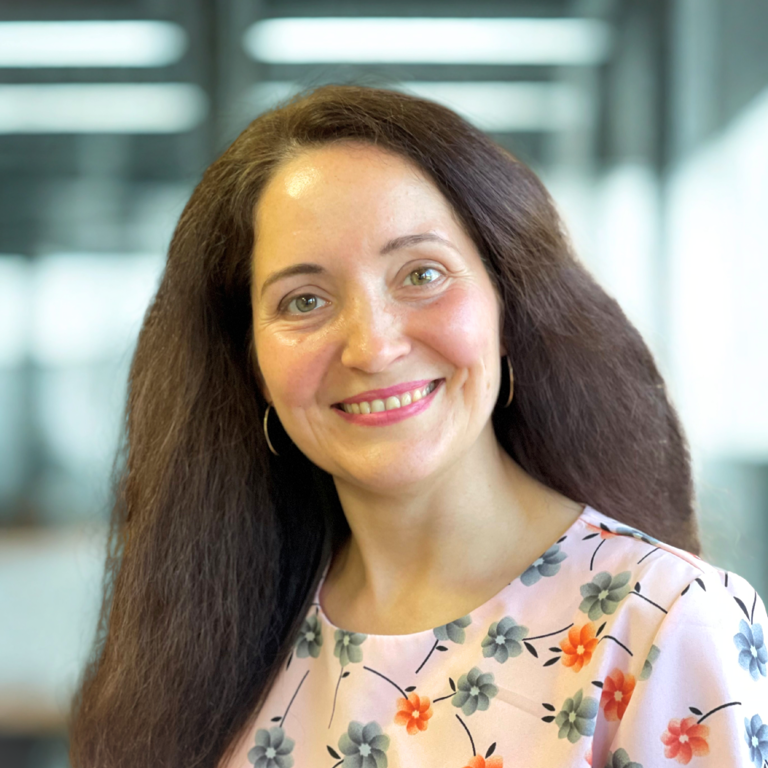 Headshot photo of a lady in an office